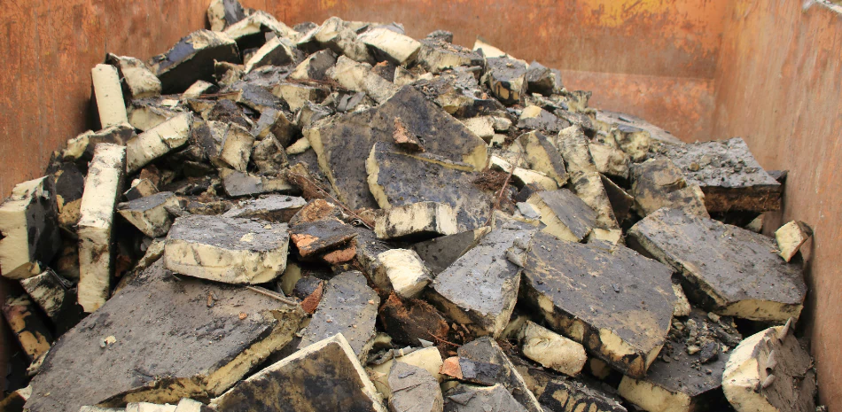 removed insulations placed in a disposal container